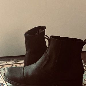 Black leather motorcycle style boot